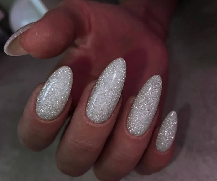 White Glittery Almond Nails, White Nye Nails, Nye Nails Almond Shape, White Sparkly Acrylic Nails, White Sparkly Nails, White Sparkle Nails, Sparkly Nail Designs, Sparkly Acrylic Nails, White Almond Nails