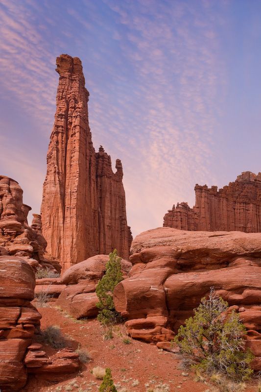 some very tall rock formations in the desert