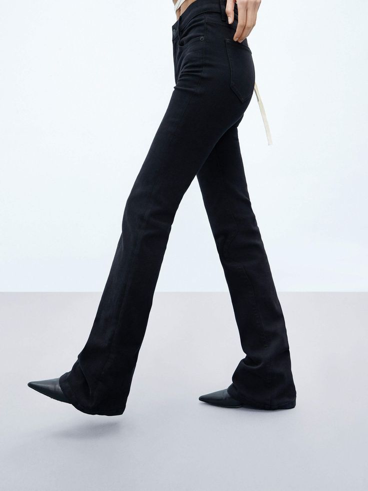 MO&Co. Women's Flared Mid Waist Stretch Jeans These classic jeans are a tried-and-true closet staple. Crafted from a cotton blend with stretch, they fit slim and have flared-cut. The true-black wash will go with pretty much everything. Features : - Flared leg, slim fit, mid-rise, full length- Zip fly, classic five-pocket design Code: MBC3JENK02The back length of size M/27 is 108cmMATERIALS & CARE Material: 68.1% Cotton 23% Polyester 7.4% Viscose 1.5% SpandexPlease reverse mesh bag and washed sep Slim Black Jeans, Black Flared Jeans, Mid Rise Flare Jeans, Black Flare, Classic Jeans, Mesh Bag, Jeans Flare, Pocket Design, Slim Fit Jeans