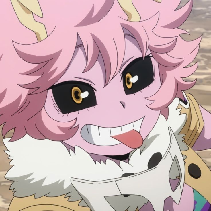 an anime character with pink hair and big eyes, smiling at the camera while standing in front of a desert area