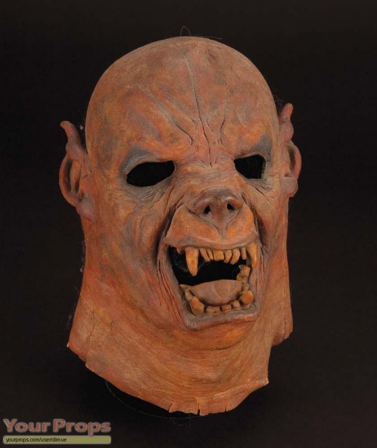 an image of a creepy mask with teeth