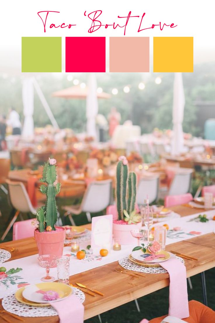 the table is set with pink and green place settings, cactus in centerpieces