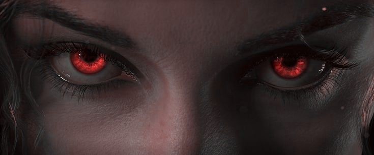 an image of a woman with red eyes looking at the camera while staring into the distance