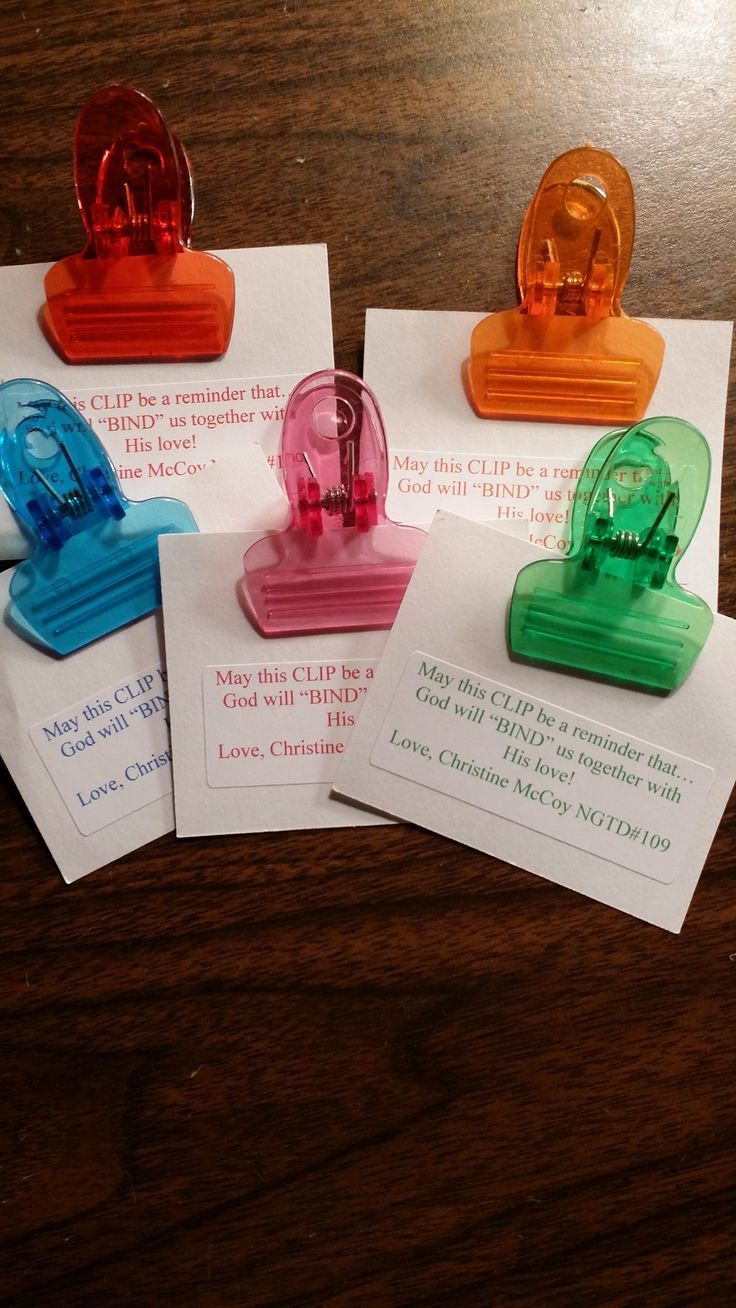 four different colored rubber stampers sitting on top of each other next to some white paper