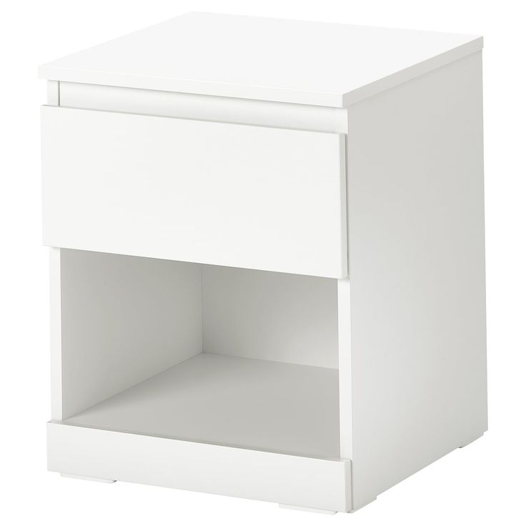 a white night stand with one drawer open