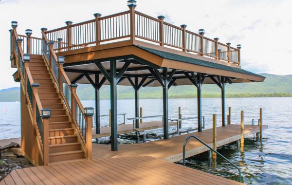 a wooden dock with steps leading to the water