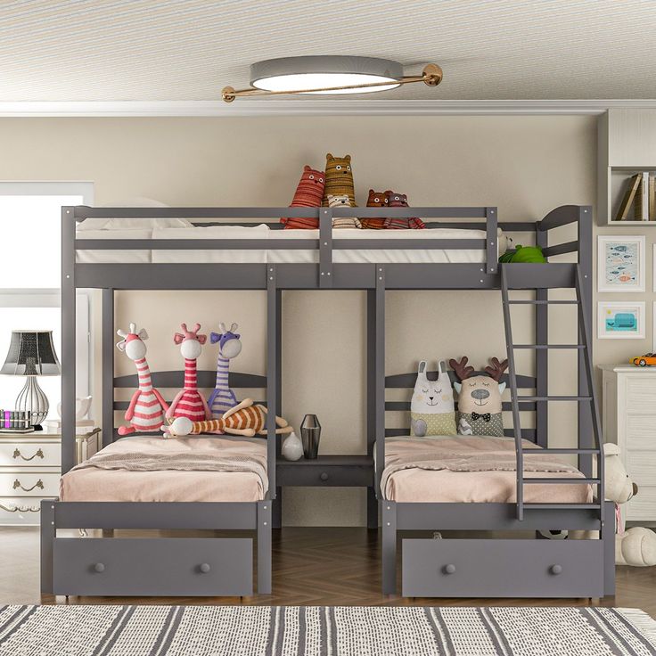 two children's bunk beds are shown in this room