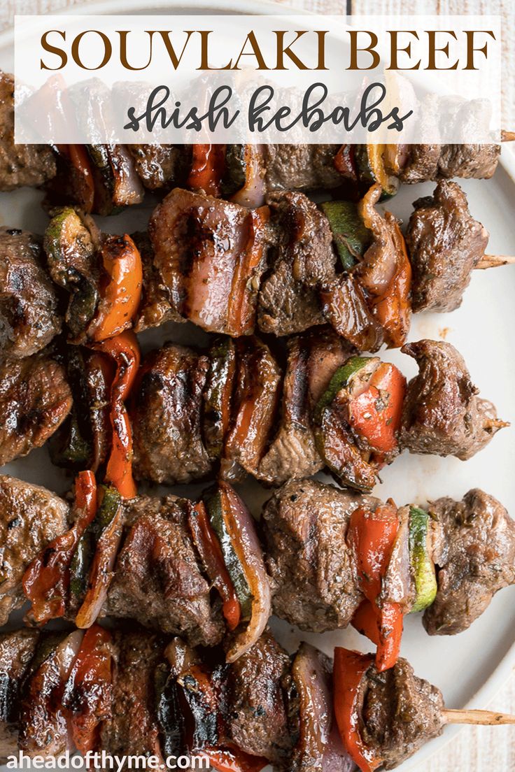 grilled beef and vegetable kabobs on a white plate with text overlay