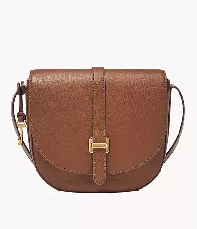 The  is a stylish and functional bag that is perfect for everyday use. It features a spacious interior, multiple pockets, and a crossbody strap that can be adjusted to your desired length. #EmeryCrossbody #CrossbodyBag Brown Leather Crossbody Purse, Purse Trends, Saddle Bag Purse, Trendy Purses, Brown Crossbody Bag, Bag Women Fashion, Stylish Handbags, Fossil Bags, Women Bags Fashion