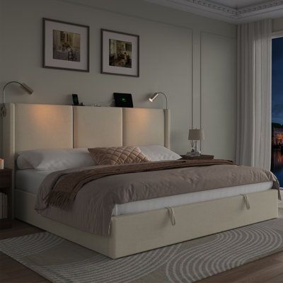 a bedroom with a large window overlooking the city at night and lit up by lamps