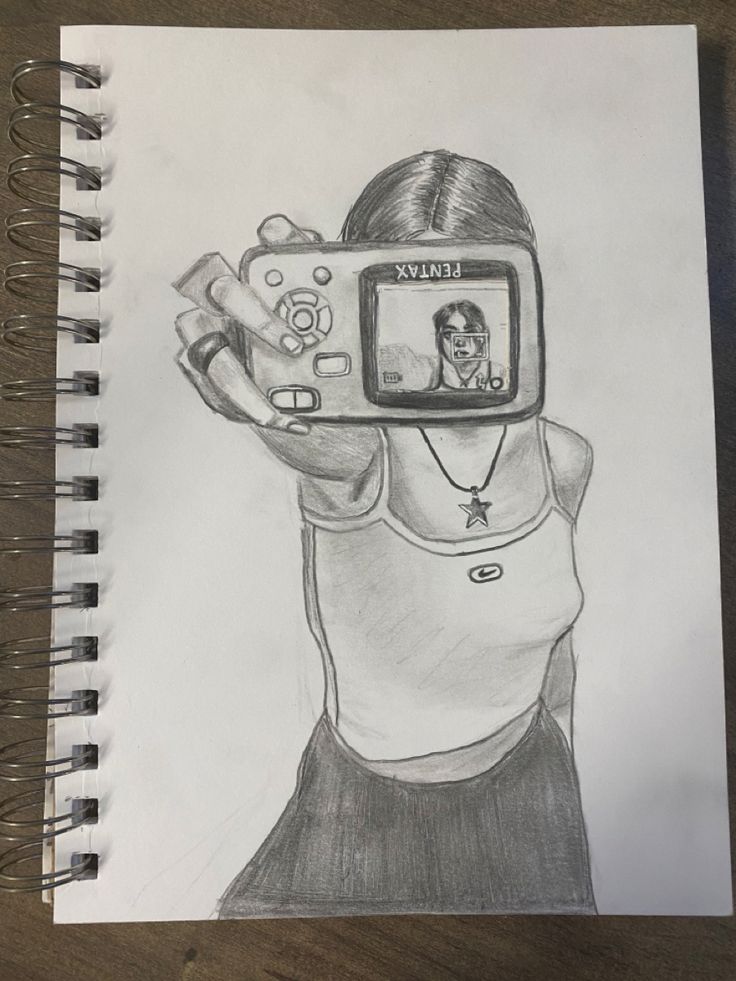 a pencil drawing of a person holding a camera up to their face with the image on it