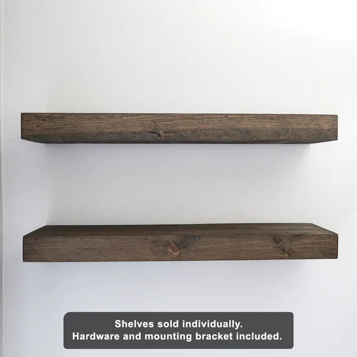 two wooden shelves on the wall with text overlay that reads shelving is individually hardware and mounting bracket included