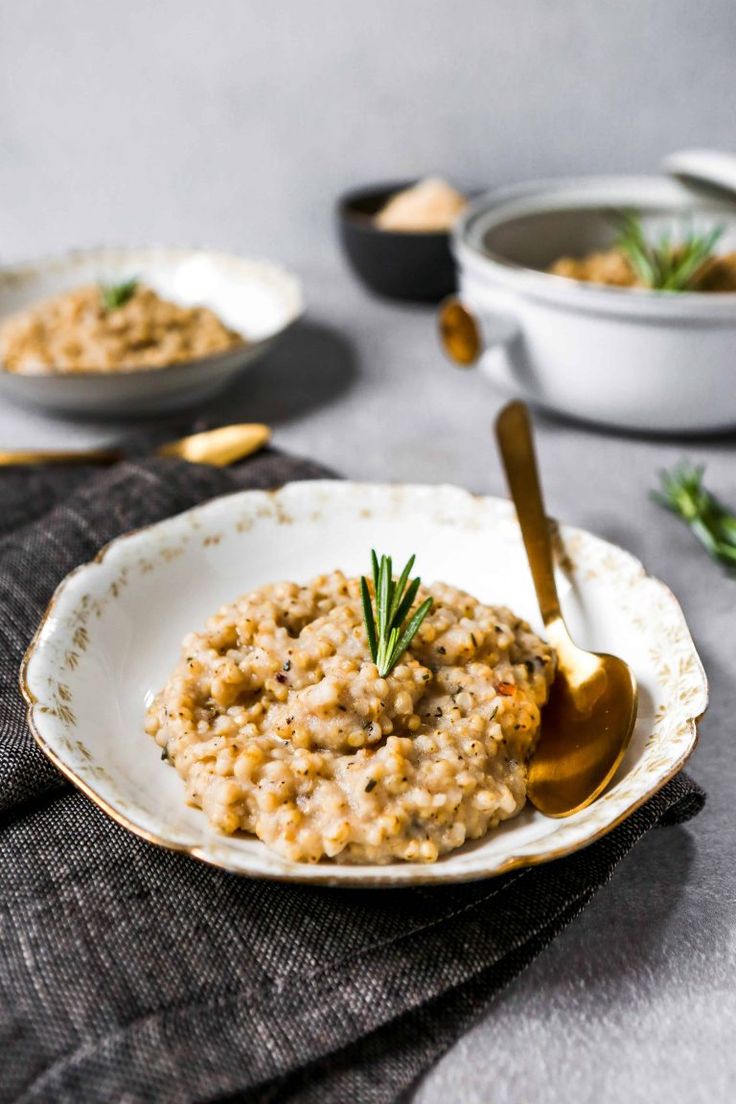 a bowl of oatmeal with a spoon in it