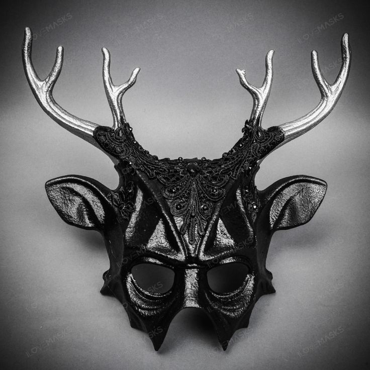 Mystery And Allure With Our Antler Deer Textured Horns With Laces Devil Halloween Masquerade Mask In Black. Perfect For Anyone Seeking An Unforgettable Halloween Costume Or Masquerade Accessory, This Mask Combines The Wild Elegance Of Antler Deer Horns With The Mysterious Charm Of A Masquerade. Crafted From Durable Plastic, The Mask Features A Textured Design That Mimics The Aged Look Of Antique Artifacts, Painted In A Popcorn Textured Black To Enhance Its Appeal. Measuring Approximately 14 Inch Dark Masquerade Mask, Gothic Horned Masquerade Mask For Costume Party, Black Halloween Masks And Prosthetics For Theater, Black Masks And Prosthetics For Halloween Theater, Black Theater Masks And Prosthetics For Halloween, Horned Masquerade Mask For Halloween, Gothic Black Masks For Party, Gothic Black Masquerade Mask For Theater, Black Gothic Masks For Party