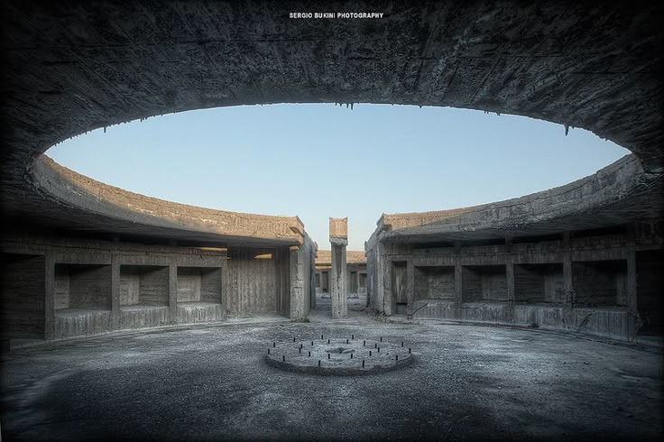 an empty room with no people in it and only one person standing inside the building