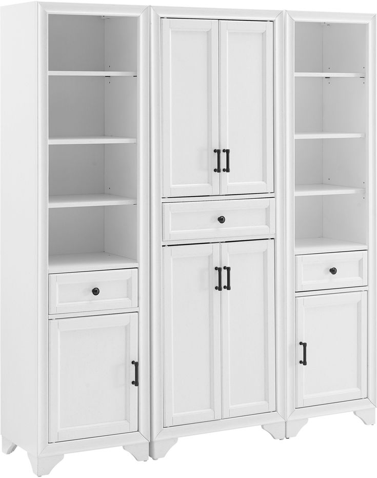 two white bookcases with doors and drawers next to each other on a white background