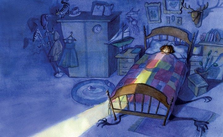 a child's bed in a room with blue walls