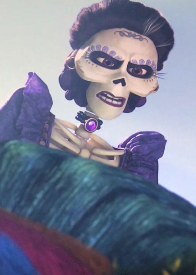 a woman in skeleton makeup and purple dress with her hands on her hips, looking up at the sky