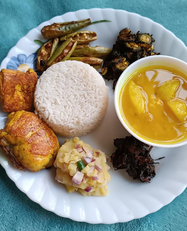 a white plate topped with different types of food