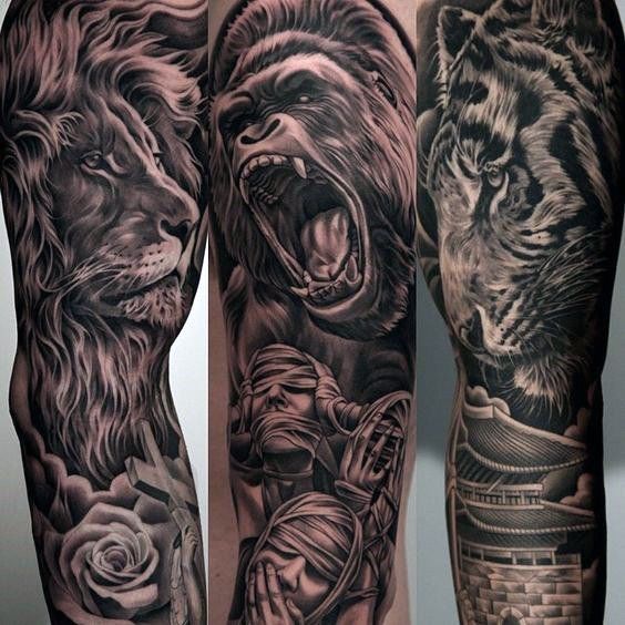 two men with tattoos on their arms and legs, one has a tiger and the other is a lion