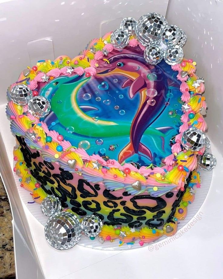 a cake decorated with an image of a dolphin