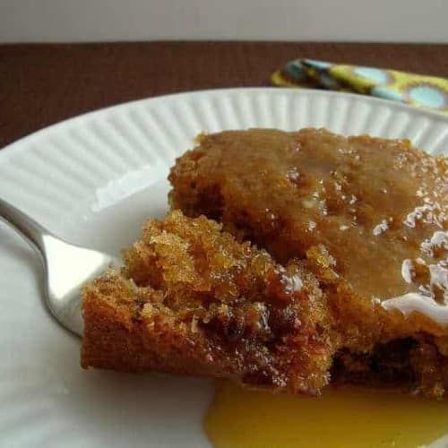 a piece of cake sitting on top of a white plate