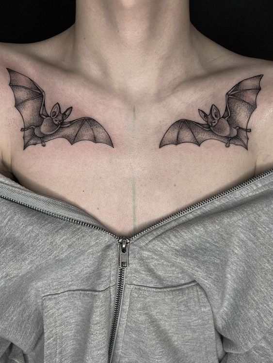 a woman with a bat tattoo on her chest