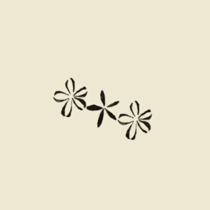 two black and white flowers on a light beige background, with the word love written below it