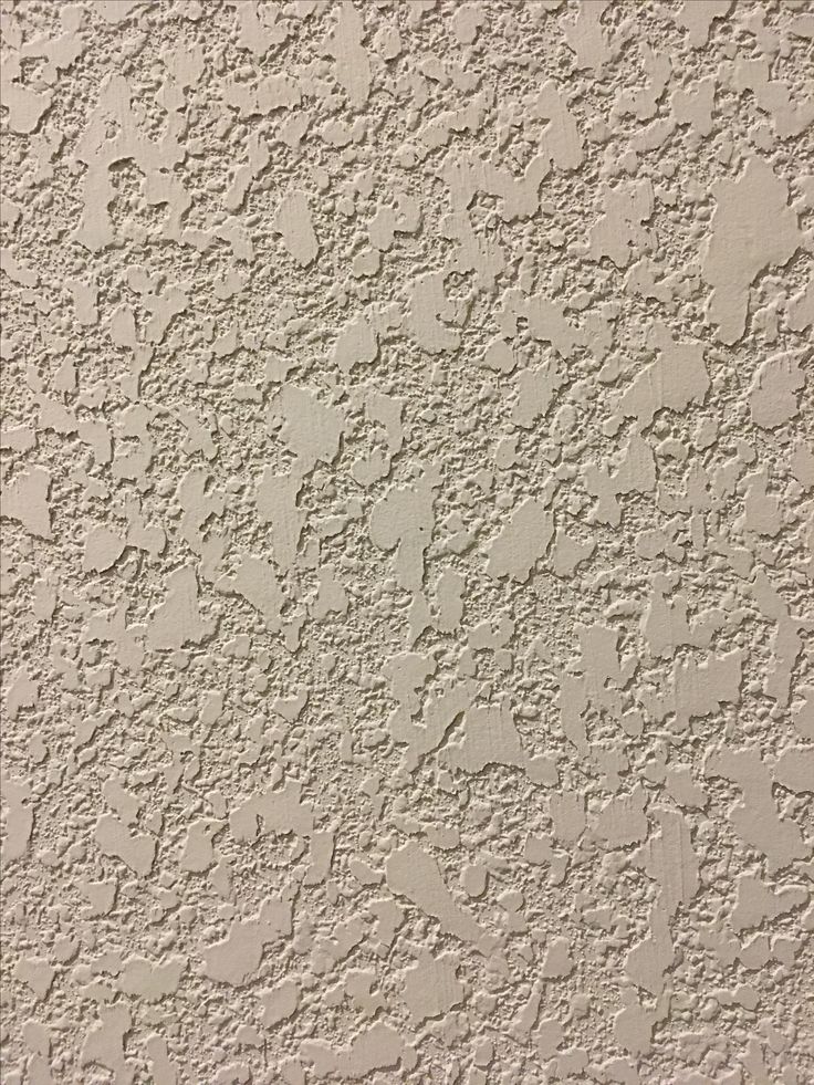 an image of a textured wall with white paint