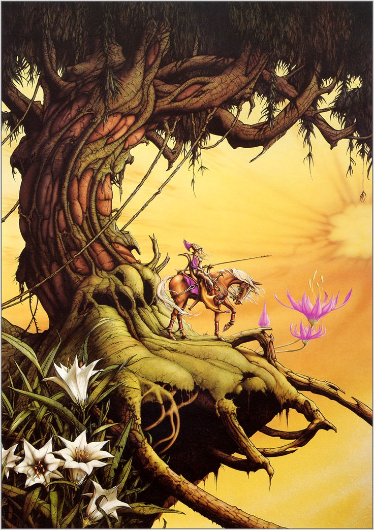 an image of a tree with flowers in the foreground and a man on a horse in the background