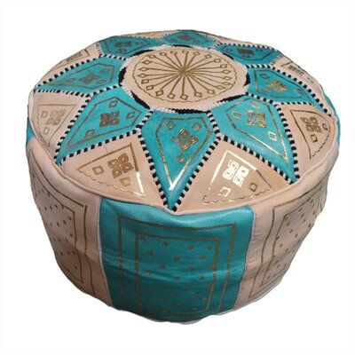 a blue and white round box with designs on the top, sitting in front of a white background