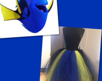 a blue and yellow fish tutu skirt is shown in front of a mannequin