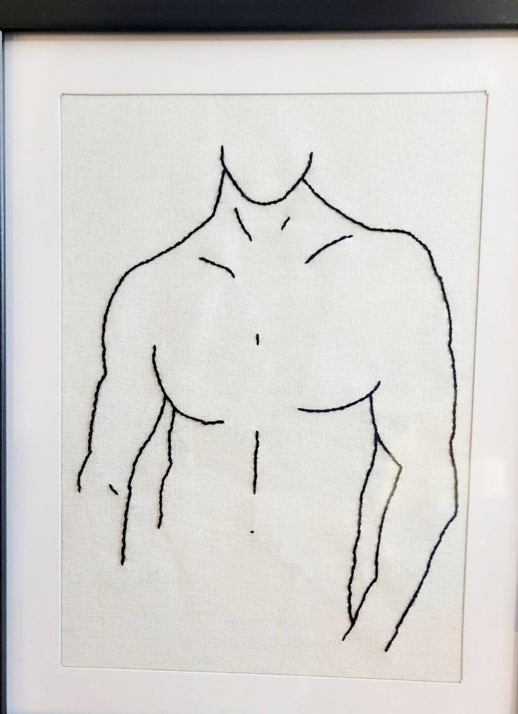 a drawing of a man's torso is shown in a black and white frame