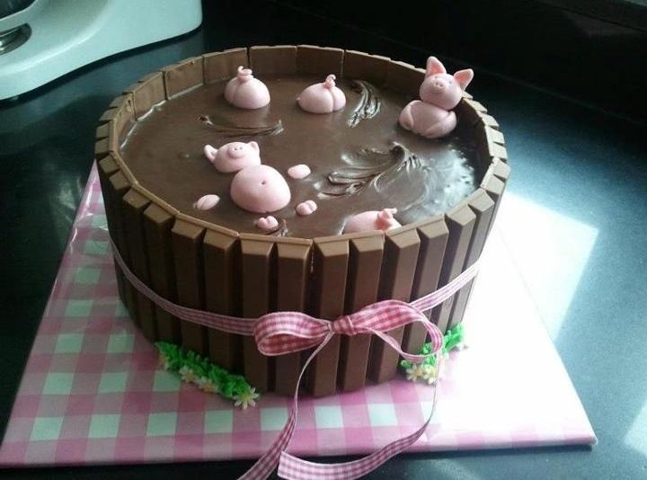 the cake is made to look like pigs