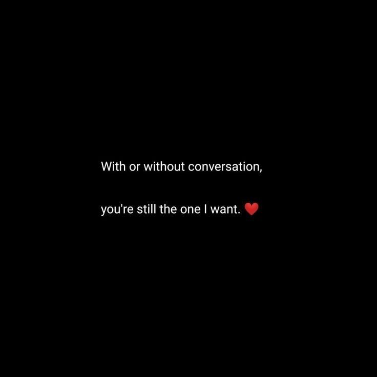 a black background with a red heart in the center and text that reads, with or without conversation, you're still the one i want