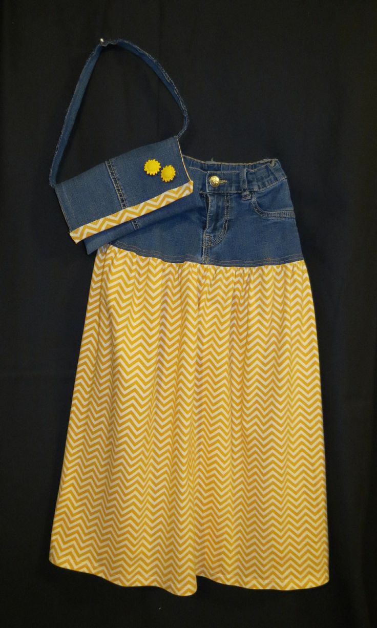 a yellow and blue skirt with two buttons on the front, one buttoned down