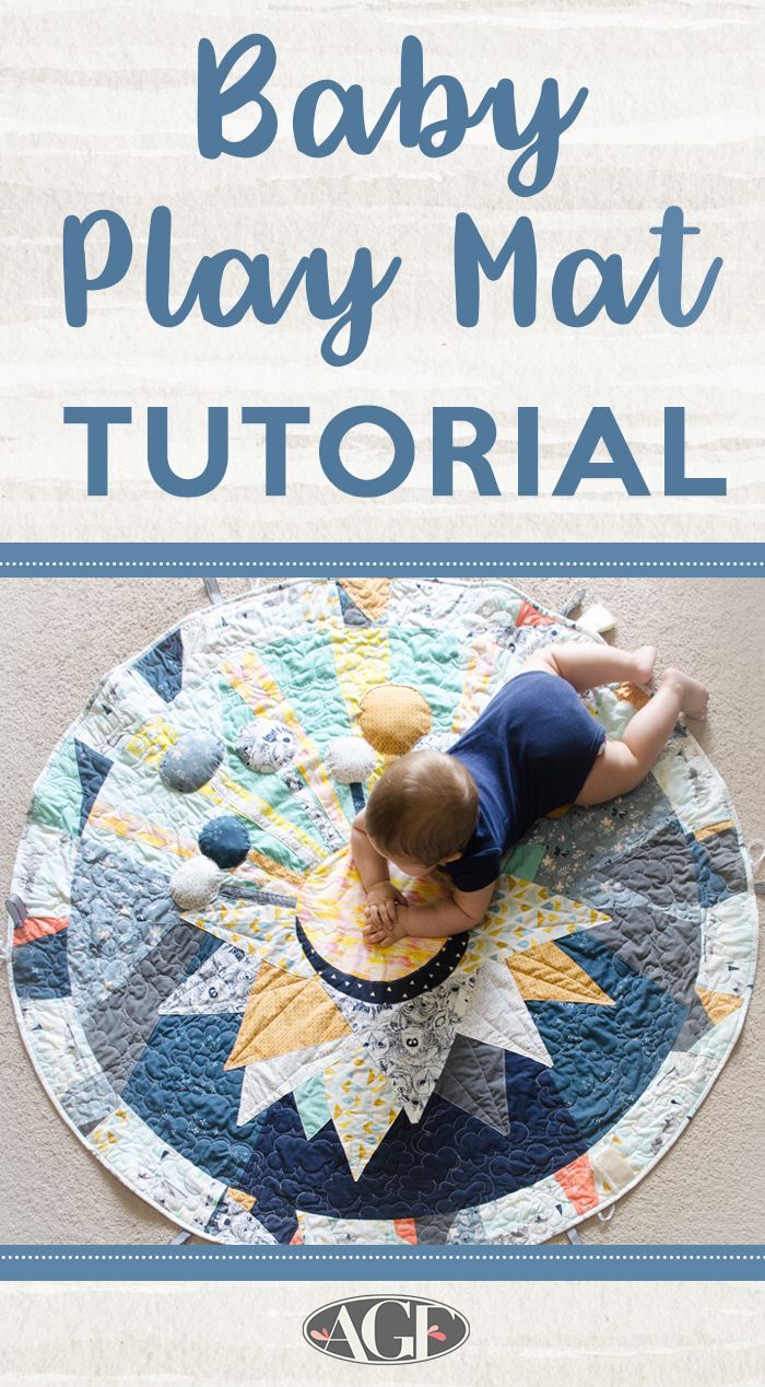 a baby laying on top of a rug with the words, baby play mat tutor