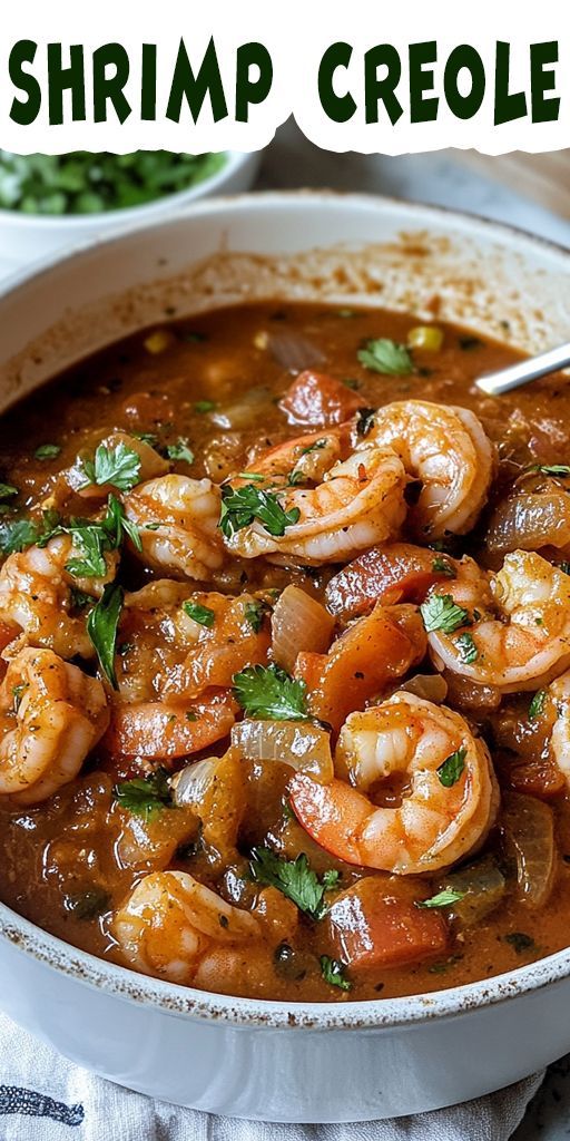 a bowl filled with shrimp and tomato soup