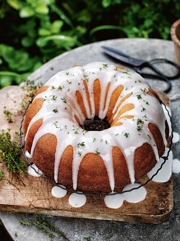 a bundt cake sitting on top of a wooden cutting board