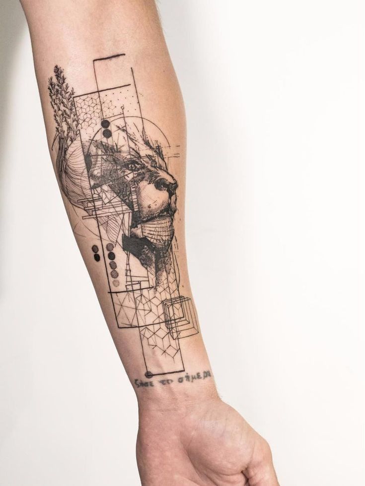 a person's arm with a tattoo on it that has an image of a bear