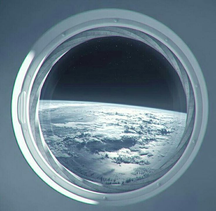 the view from inside an airplane window looking out on earth