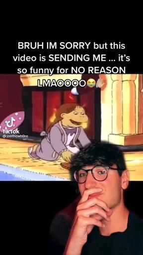 a man with glasses sitting in front of a cartoon character and saying, bruh im sorry but this video is sending me it's so funny for no reason