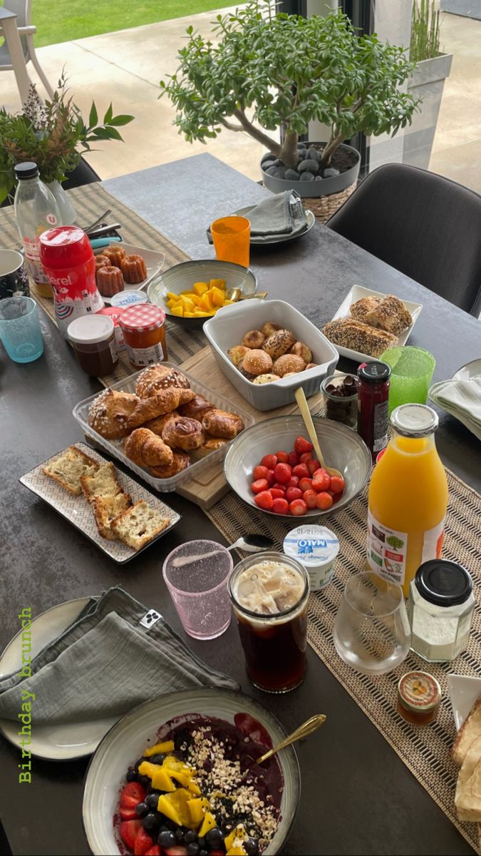 a table full of food and drinks on it