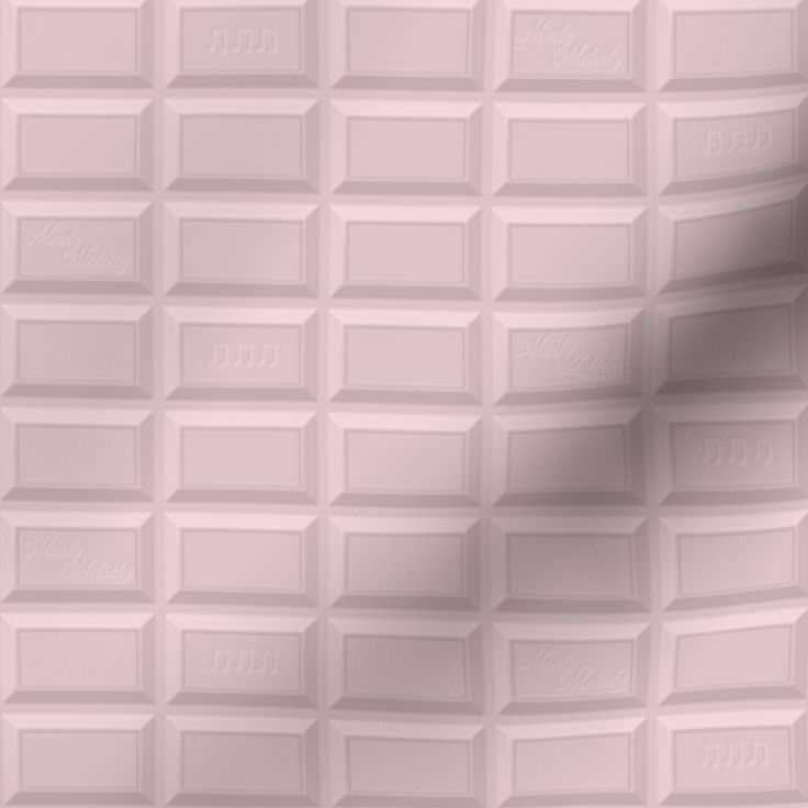 a pink wall with white squares on it