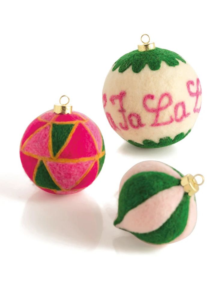 three ornaments with the word to say on them