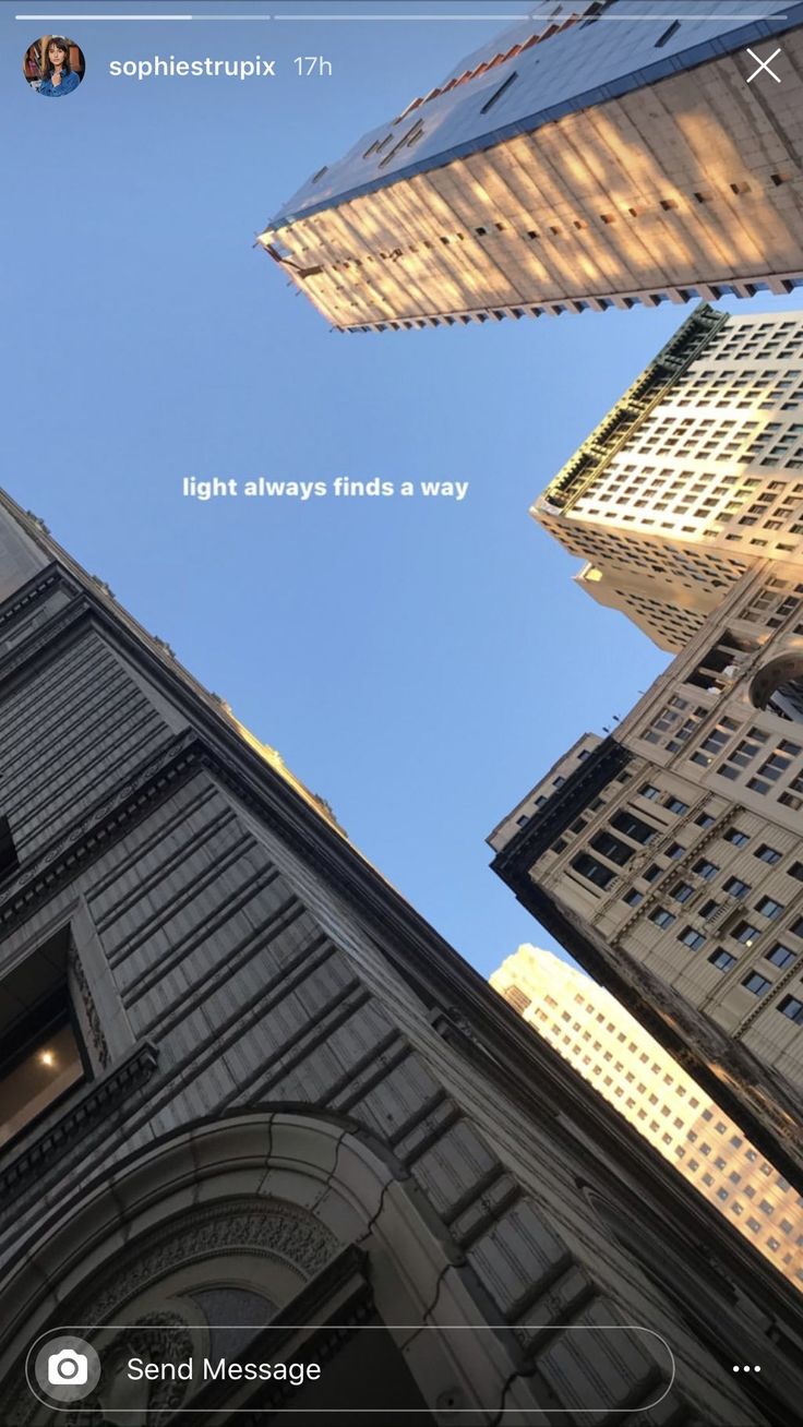 looking up at tall buildings from the ground