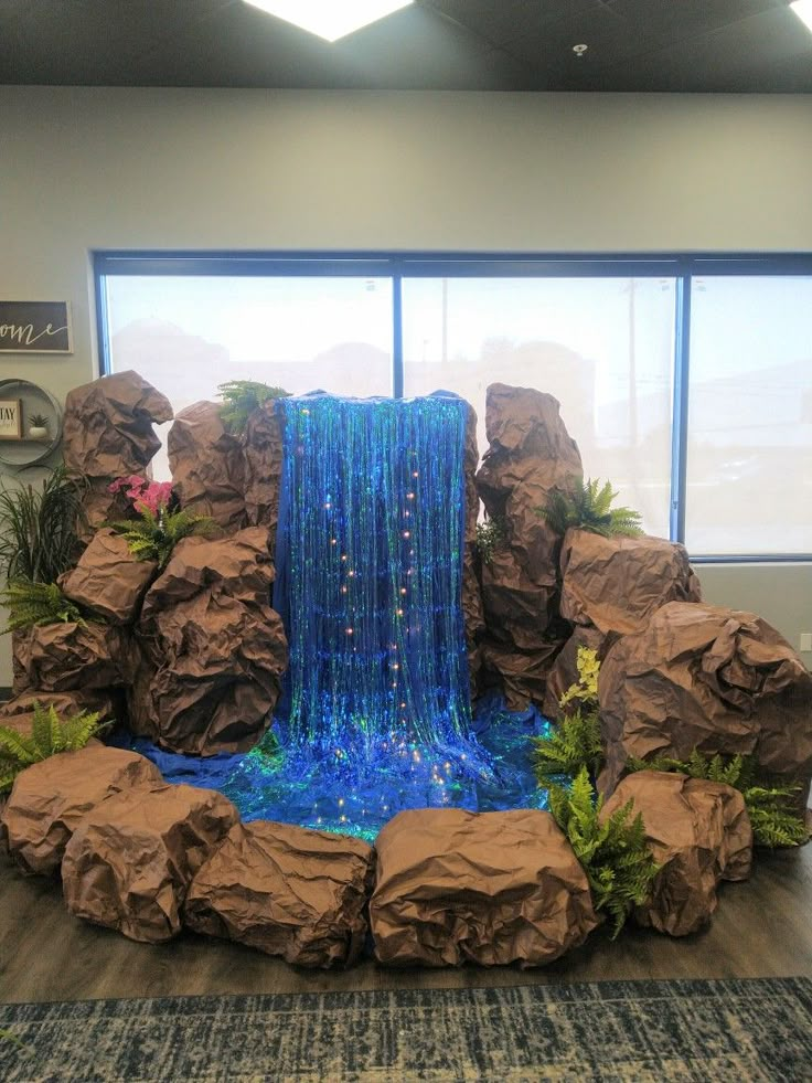 Calvary Chapel Santa Fe Springs VBS Waterfall Decoration, Diy Waterfall, Jungle Decorations, Ganpati Decoration At Home, Ganapati Decoration, Deco Jungle, Luau Theme Party, Decoration For Ganpati, Vbs Themes