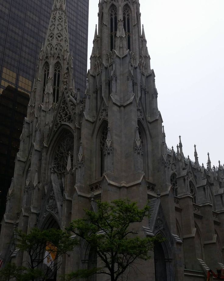 the large cathedral has many spires on it's sides