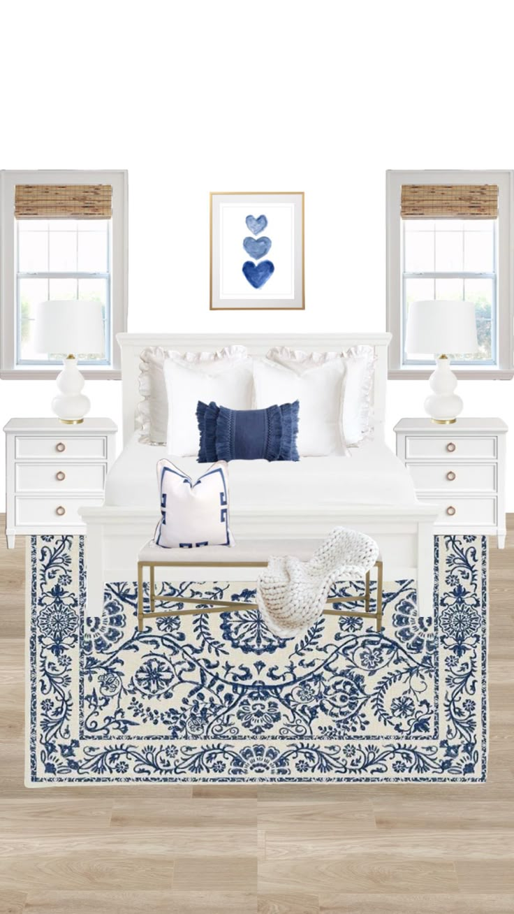 a white bedroom with blue and white decor on the bed, nightstands and windows