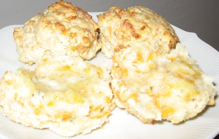 some biscuits are on a white plate and ready to be eaten